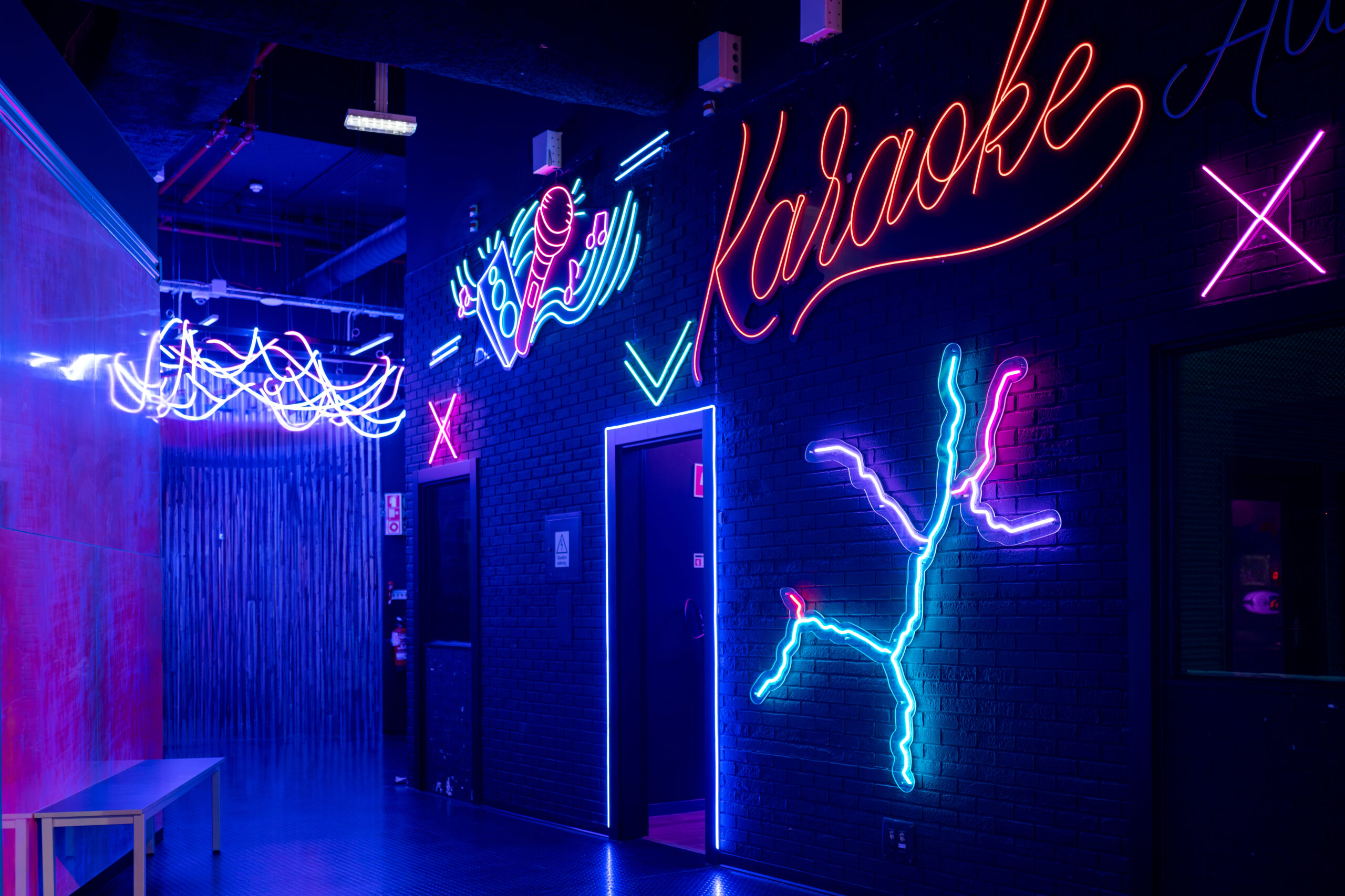 glowing neon sign with word karaoke and microphone 2024 12 12 23 09 45 utc scaled